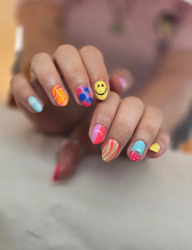 Bright hand-painted set with a smiley, strawberry and swirls