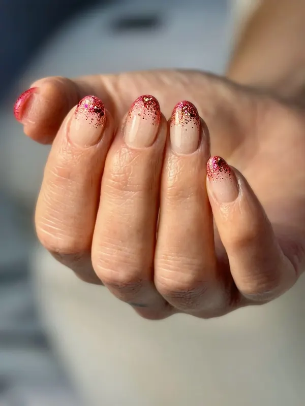 Nude gel with a red glitter fade